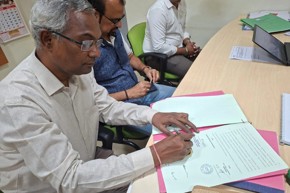 Signing Bharathidasan University diploma in film technology course at a film academy in Chennai, Tamil Nadu.