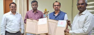 Four men display Bharathidasan University diploma in film technology course in Chennai at a film academy in Tamil Nadu.