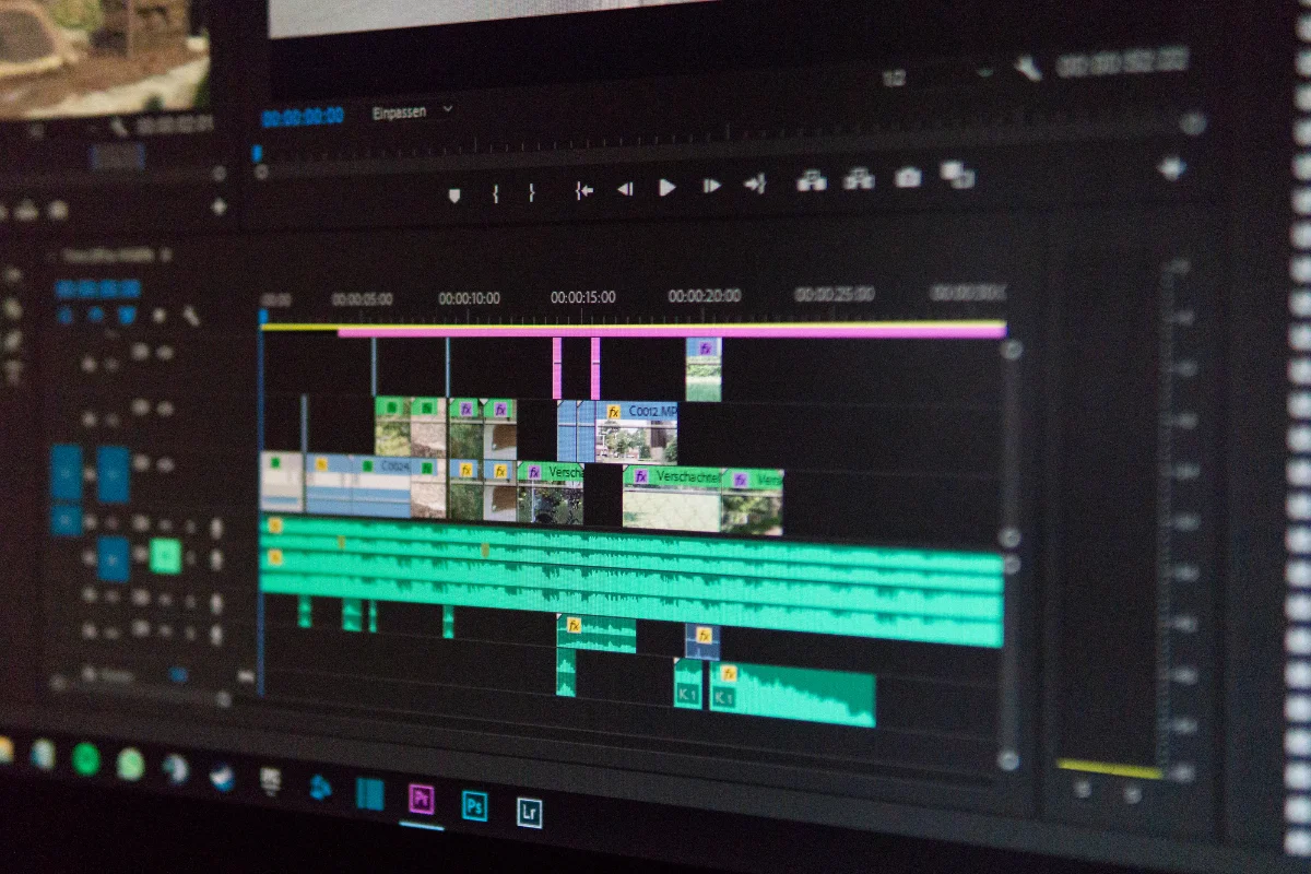 Close-up view of a professional video editing software interface showing multi-track audio and video timelines